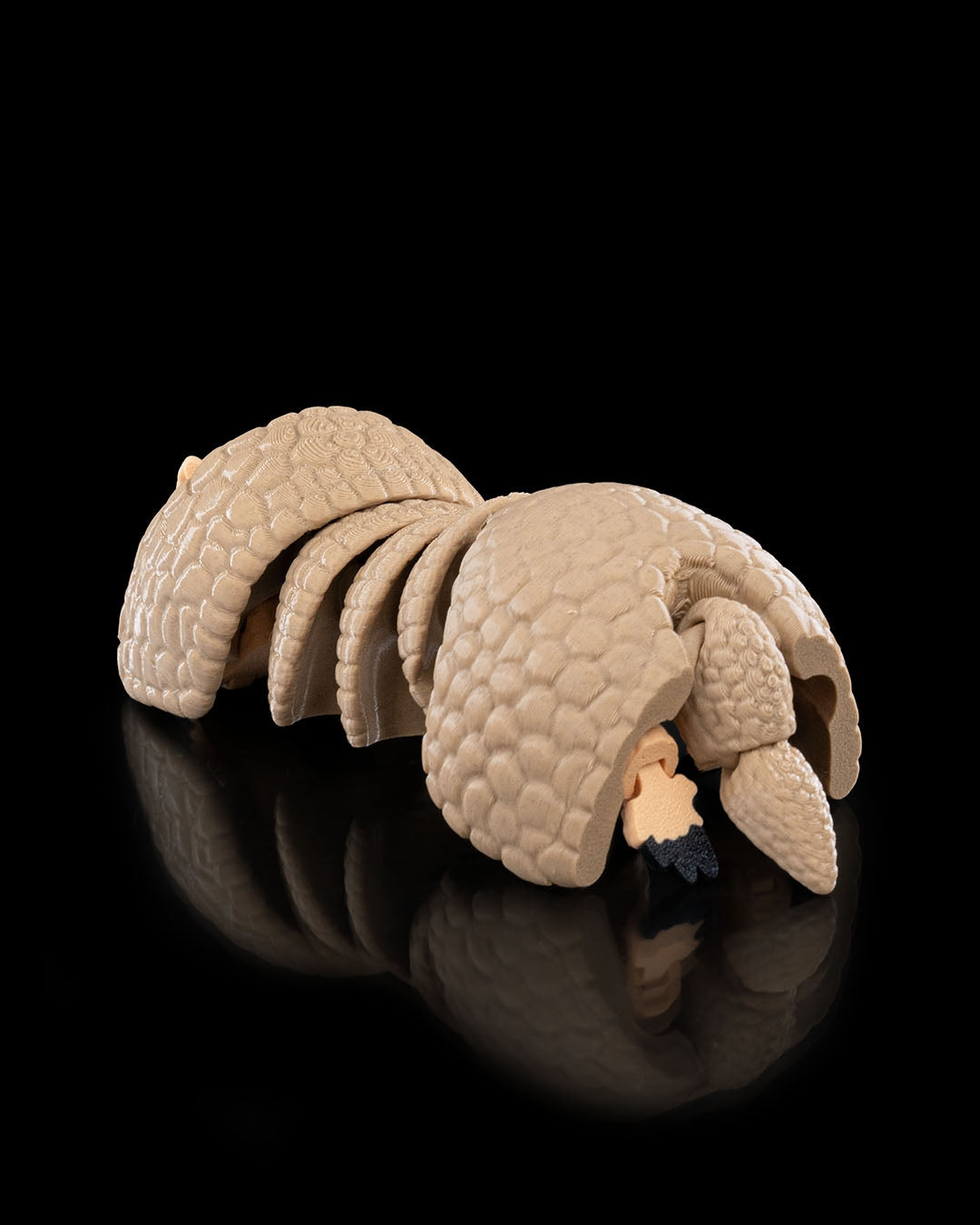 3D-printed Armadillo figurine, curled into a ball, top view