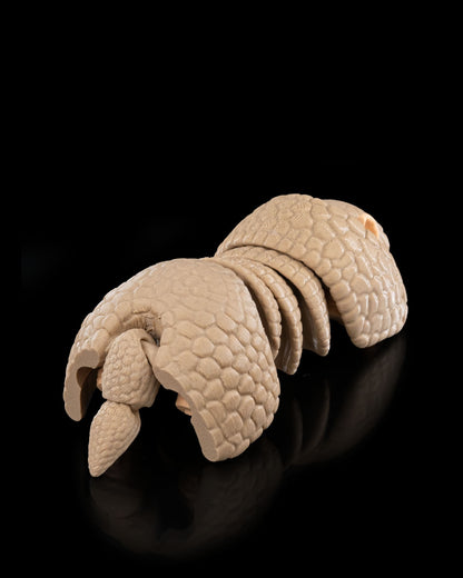 3D-printed Armadillo figurine, curled pose, front angle view