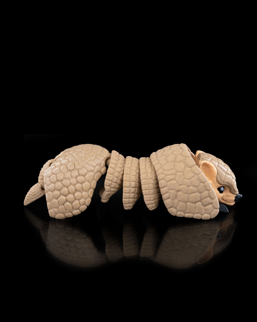3D-printed Armadillo figurine, side view showing armor plating detail